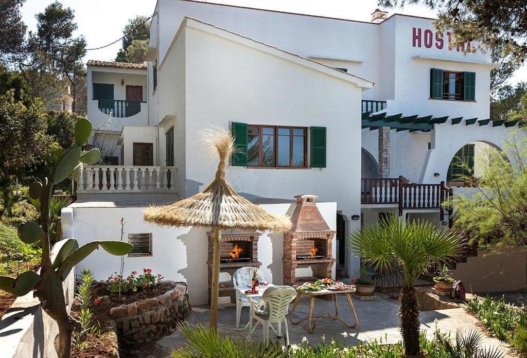 Hostal Los Pinos Cala de Sant Vicenc Esterno foto